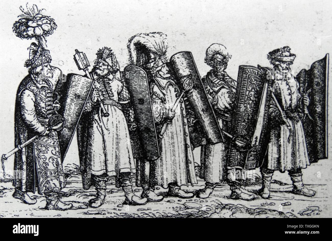 16th Century Hungarian soldiers shown in the outfits of the time. From a wooden engraving in 'The Triumph of King Maximillian I'. Stock Photo