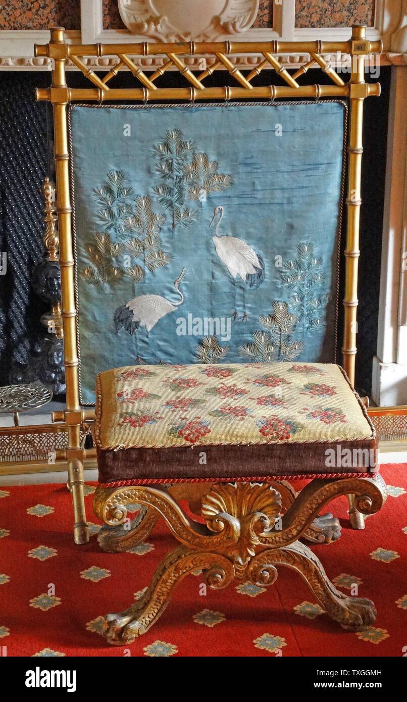 18th century footstool with embroidered fire cover or decorative screen, English Stock Photo