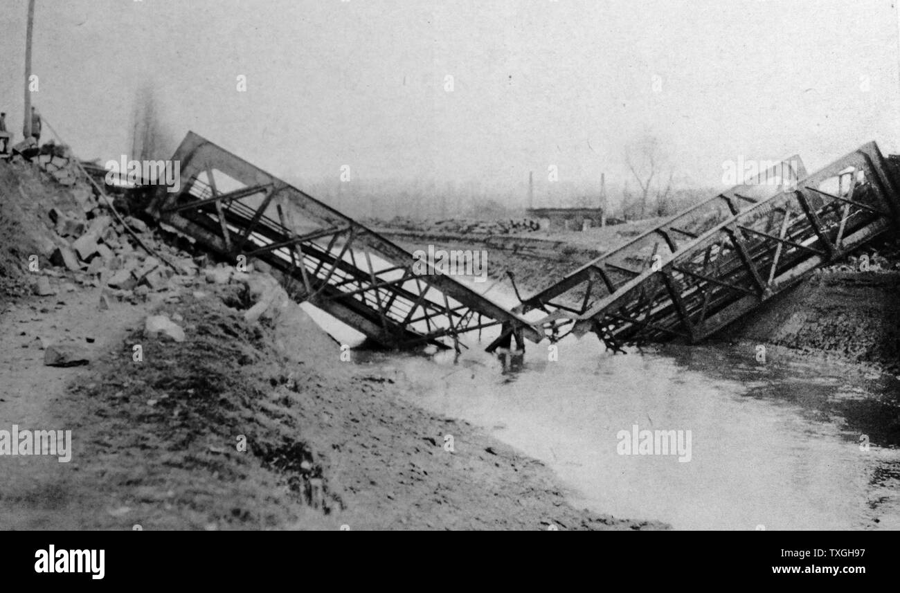 Bridge destroyed by retreating French troops to impede the advance of the German Army, during World war One 1914 Stock Photo
