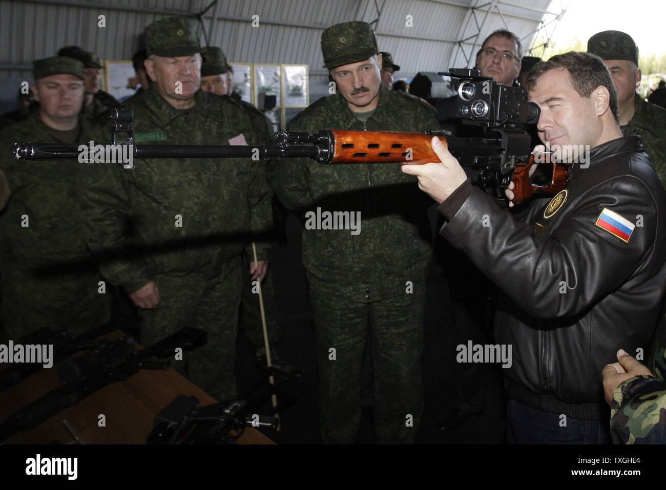Russian President Dmitry Medvedev R Holds Examines A Sniper Rifle As Belorussian President Alexander Lukashenko C Looks On During The Final Stage Of Zapad 2009 West 2009 Russian Belarus Joint Military Exercises Near Brest
