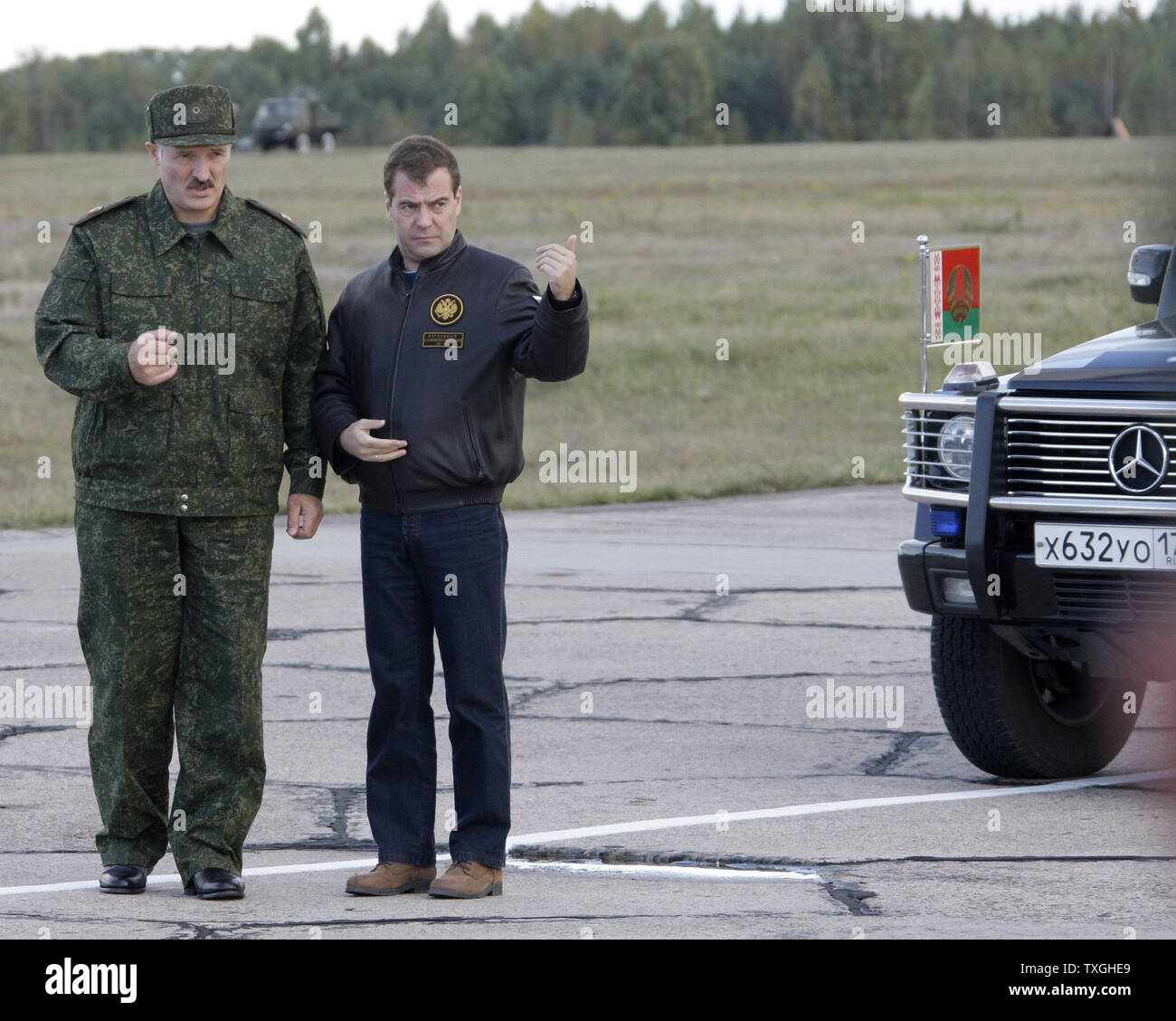 Russian President Dmitry Medvedev (R) and Belorussian President Alexander Lukashenko attend the final stage of Zapad-2009 (West 2009) Russian-Belarus joint military exercises at at Obuz-Lesnovsky training range near Brest in western Belarus on September 29, 2009. UPI/Anatoli Zhdanov Stock Photo