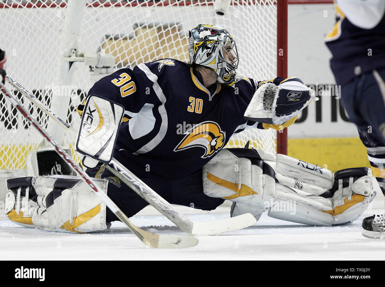 Buffalo Sabres Center Goalie Ryan Miller 30 Makes A Glove Save Against The Ottawa Senators In