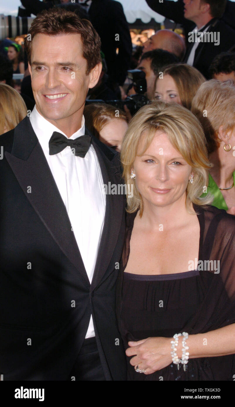 British actors Rupert Everett and Jennifer Saunders pose for photographers on the red carpet before the gala screening of 'Shrek 2' at the Palais des Festivals May 15, 2004 during the Cannes Film Festival in Cannes, France. (UPI Photo/Christine Chew) Stock Photo