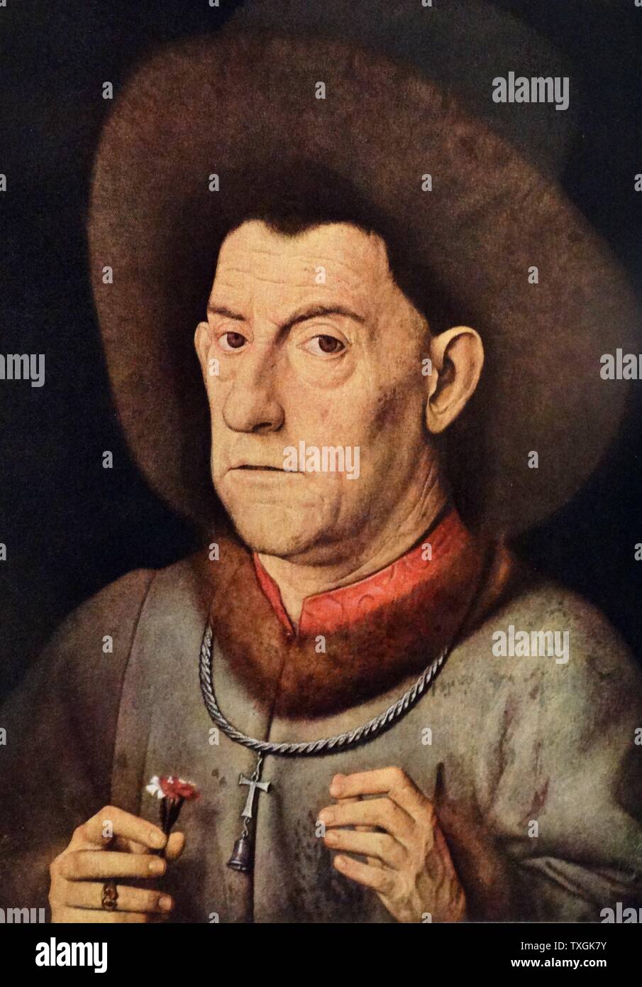 Painting titled 'The Man with the Pink' by Jan van Eyck (1390-1441) an Early Netherlandish painter. Dated 15th Century Stock Photo