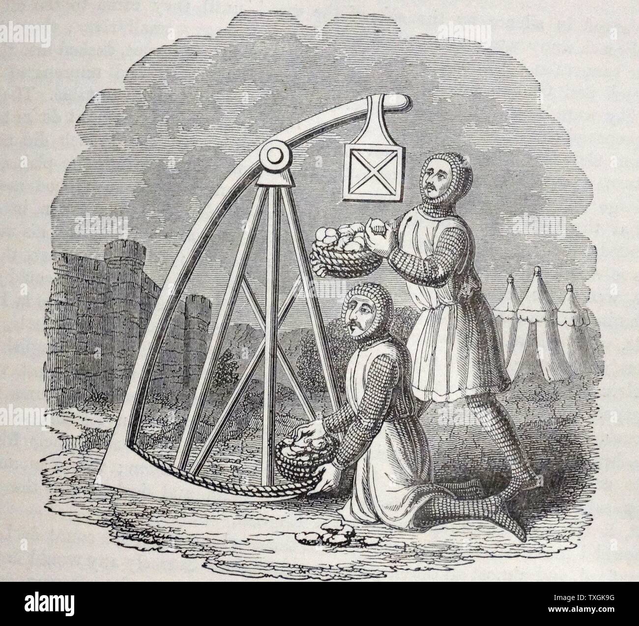 Engraving of a Trebuchet, a machine used for casting stones. Dated 14th Century Stock Photo