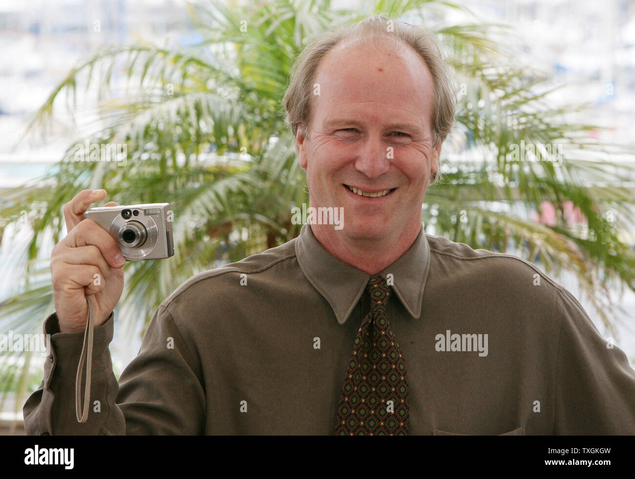 William Hurt snaps a picture at the photocall of his new movie "The