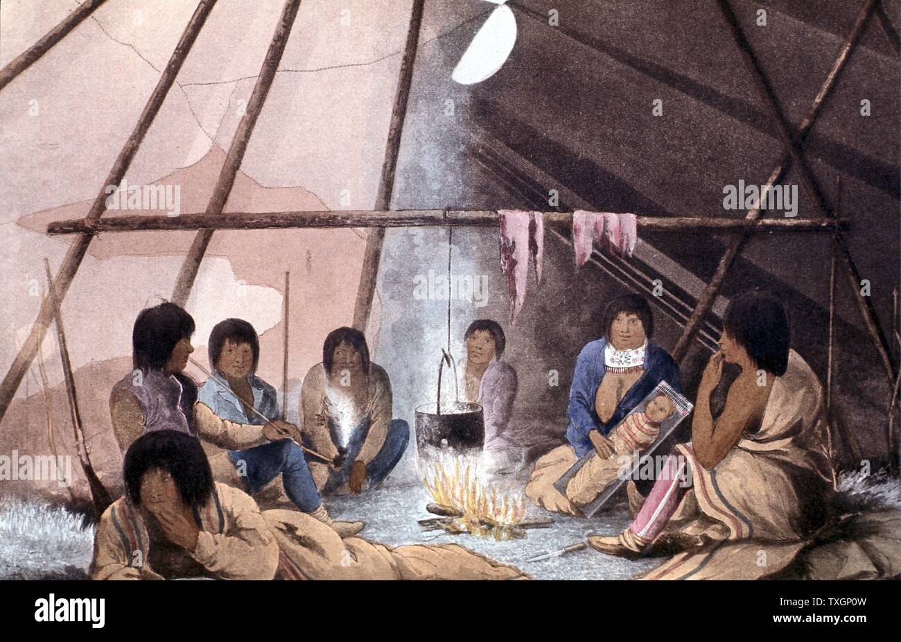 Interior of Cree Indian tent. Man smoking: Papoose in 'cradle': Cooking pot suspended over fire. From John Franklin 'Narrative of a Journey to the Shores of the Polar Sea' 1823 London Coloured lithograph Stock Photo