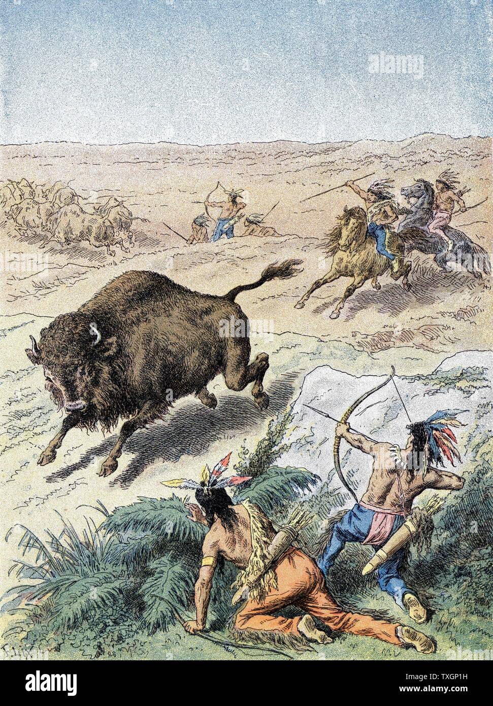 North American Indians hunting buffalo (North American Bison) on prairies with bows and arrows and spears c.1870  Colour-printed wood engraving Paris Stock Photo
