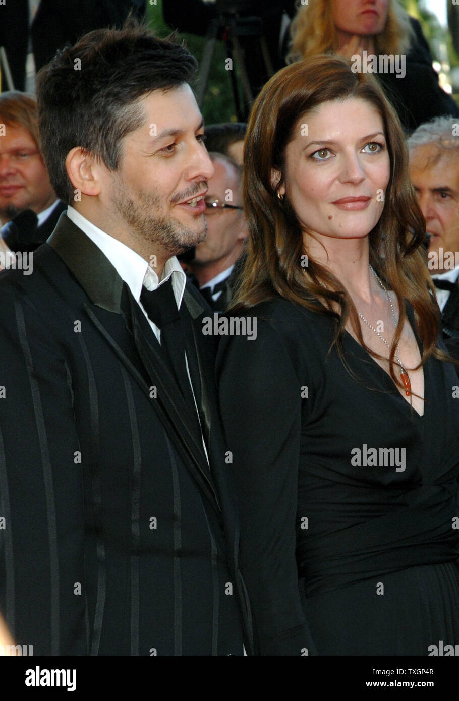 French director Christophe Honore (L) and actress Chiara Mastroianni, daughter of French star Catherine Deneuve and Italian star Marcello Mastroianni, arrive at the Palais des Festivals for the gala screening of 'Les Chansons d'Amour' at the 60th Cannes Film Festival in Cannes, France on May 18, 2007.  (UPI Photo/Christine Chew) Stock Photo