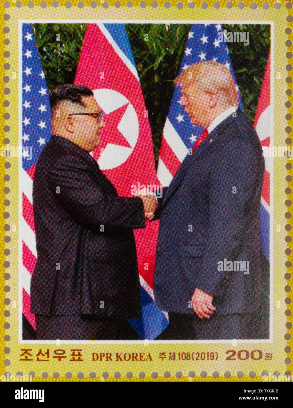 North Korea stamp celebrating the 2018 Singapore summit meeting between Donald J. Trump and Kim Jong-un with picture of the handshake Stock Photo