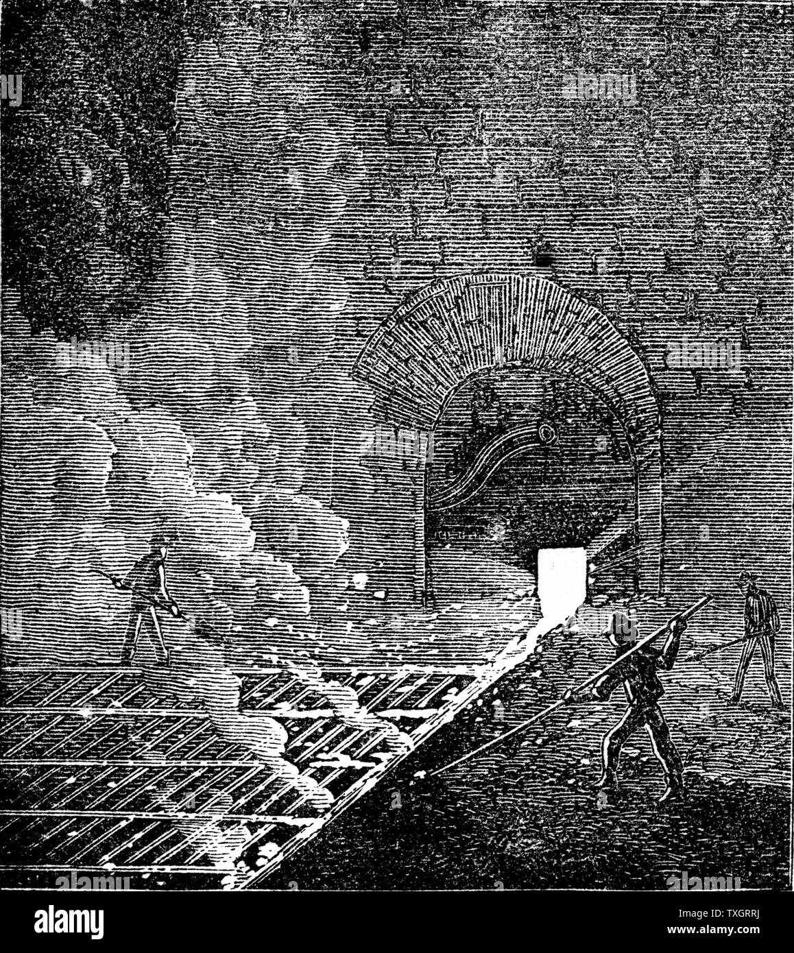 Pig Iron: tapping furnace and running molten iron into moulds to form pigs  Phoenix Iron and Bridge Works, Phoenixville, Pennsylvania.  1873 From'The Science Record' Engraving New York Stock Photo