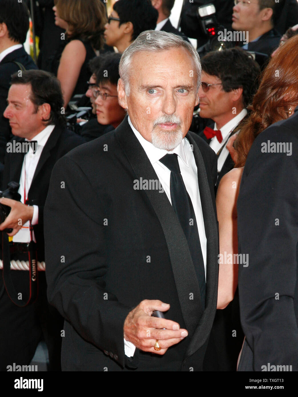 Actor Dennis Hopper arrives on the red carpet during the 61st Annual