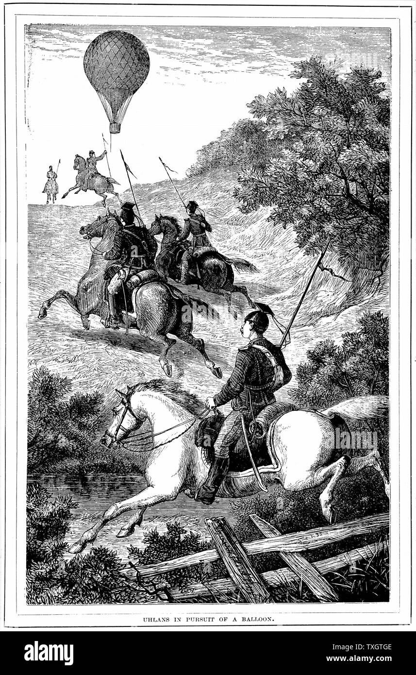 Franco-Prussian War 1870-1871: Prussian Uhlans chasing a balloon which had escaped from the besieged city of Paris 1881 Wood engraving Stock Photo