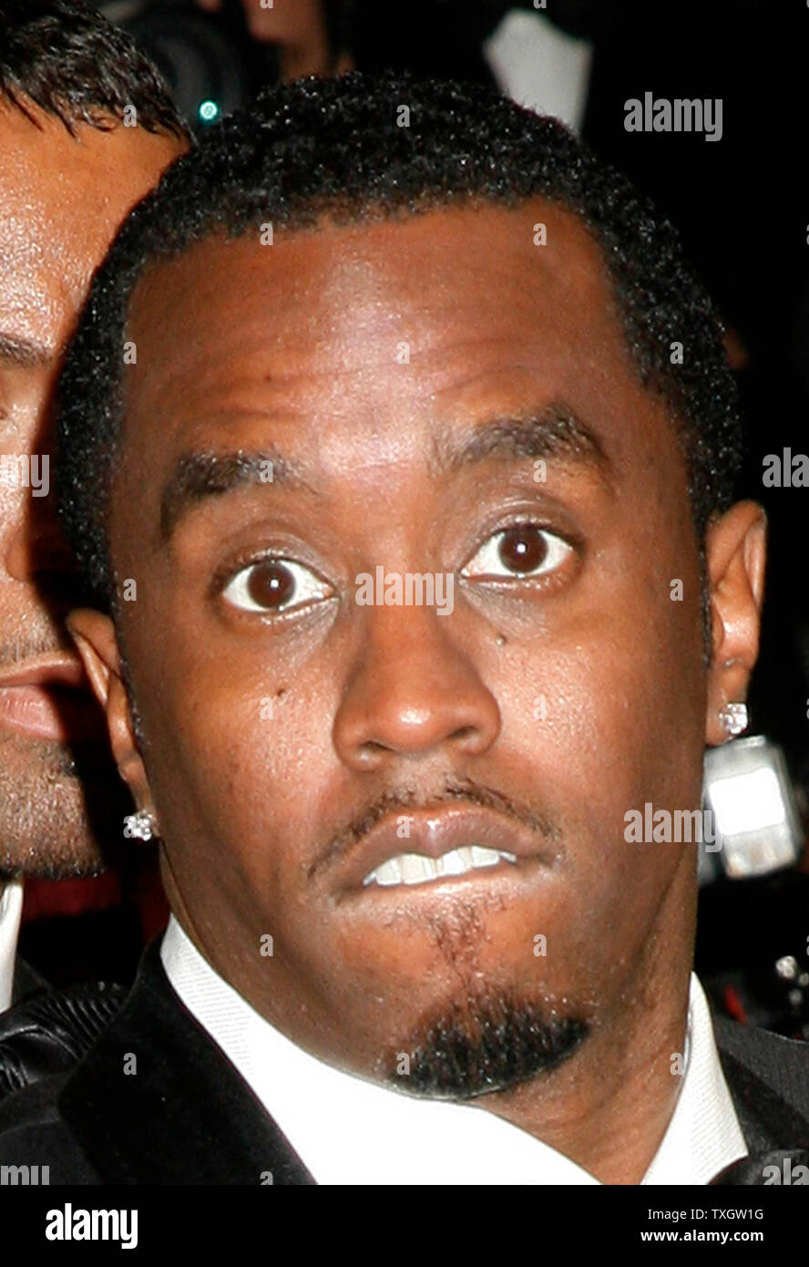 Rapper Sean Diddy Combs arrives on the red carpet before a screening of ...