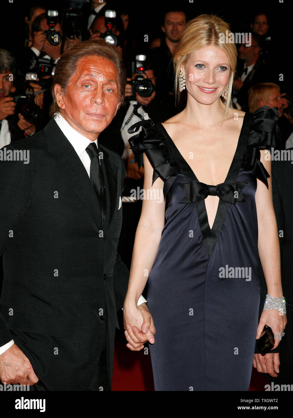 Fashion designer Valentino Garavani and actress Gwyneth Paltrow arrive on  the red carpet before a screening of the film 