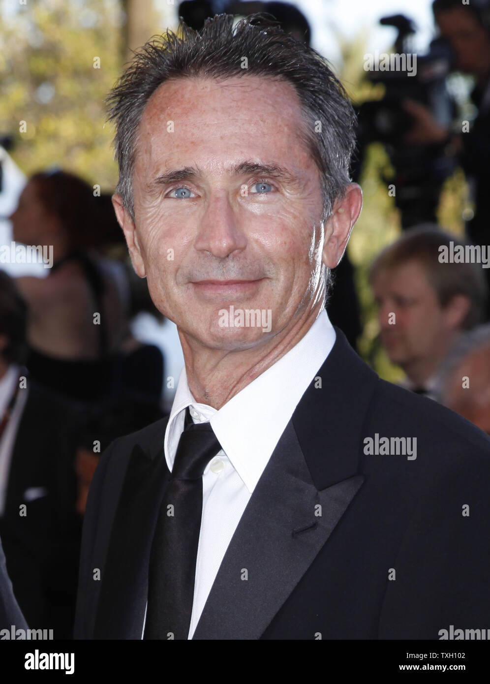 Actor Thierry Lhermitte arrives on the red carpet before a screening of