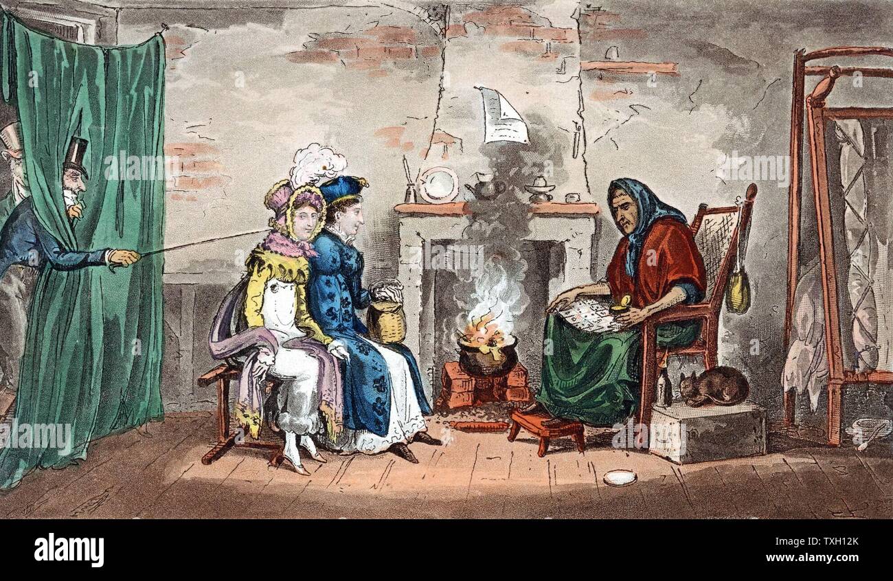 Kate and Sue having fortunes read in the cards (Cartomancy), while Tom and Jerry attract their attention.  Food is cooking in pot on fire; old woman's bed is folded against wall (right)and her pet cat sits beside her.  Illustration by IRC and G Cruikshank for Pierce Egan "Life in London" 1821.  Aquatint Stock Photo