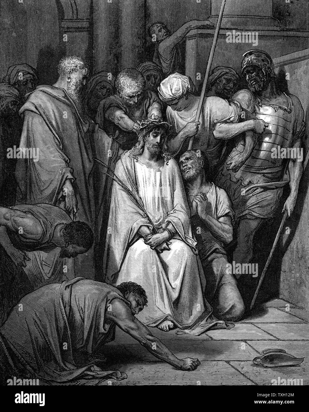 Christ mocked and the Crown of Thorns placed on his head. St John. From Gustave Dore's illustrated 'Bible', 1866. Wood engraving Stock Photo