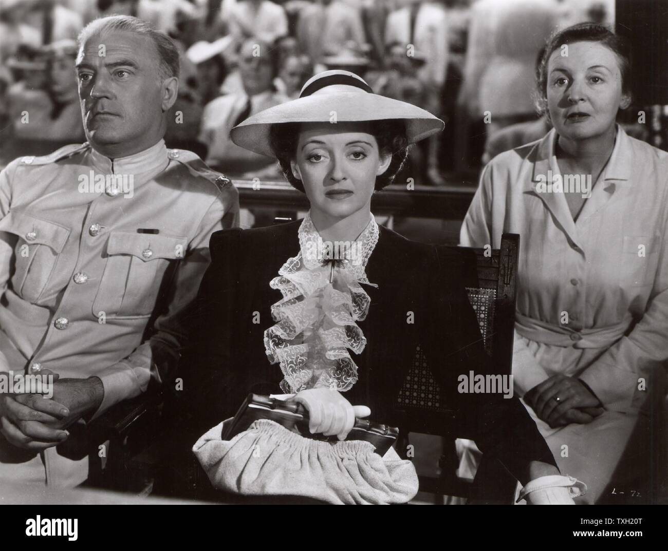 'The Letter', Warner Bros., 1940.   Producer: Robert Lord.  Director: William Wyler.  Based on short story by the English author Somerset Maugham.  Film starring Bette Davis (1908-1989) American Hollywood actress and film star. Leslie Crosbie (played by Davis) on trial. Stock Photo