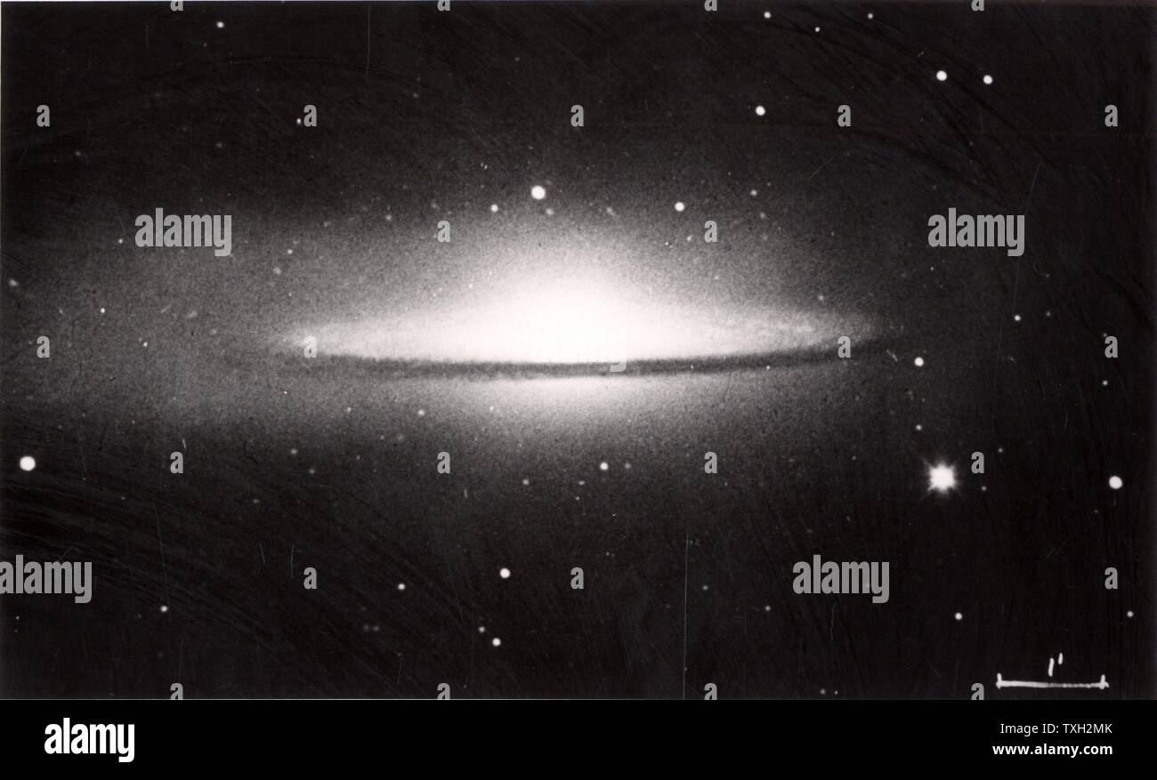 Astronomy: Spiral galaxy NGC 4594 (M 104) seen edge-on. Note the dark ...