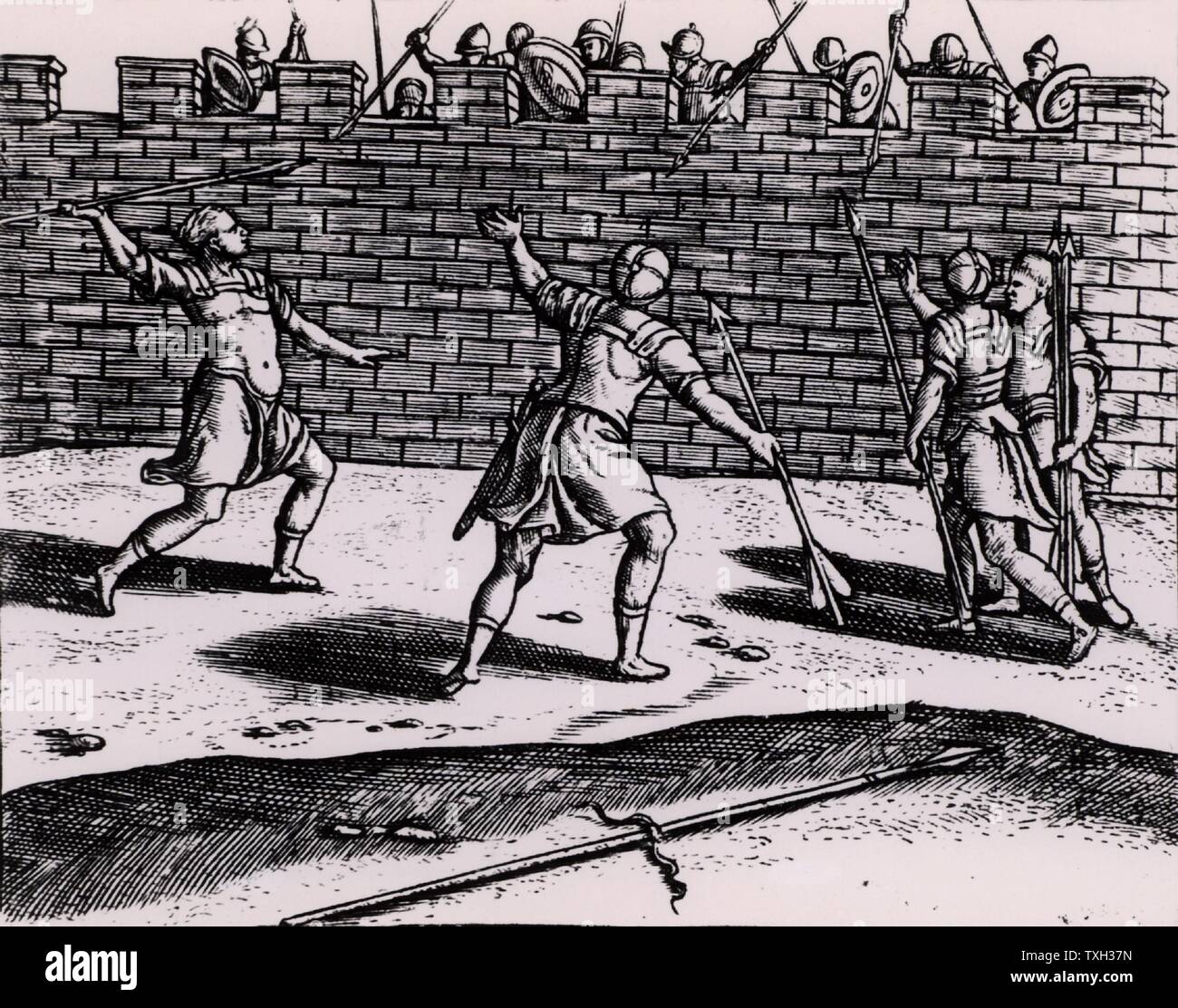 Roman spearmen attacking the walls of a besieged fortress.   From "Poliorceticon sive de machinis tormentis telis" by Justus Lipsius (Joost Lips) (Antwerp, 1605). Engraving. Stock Photo