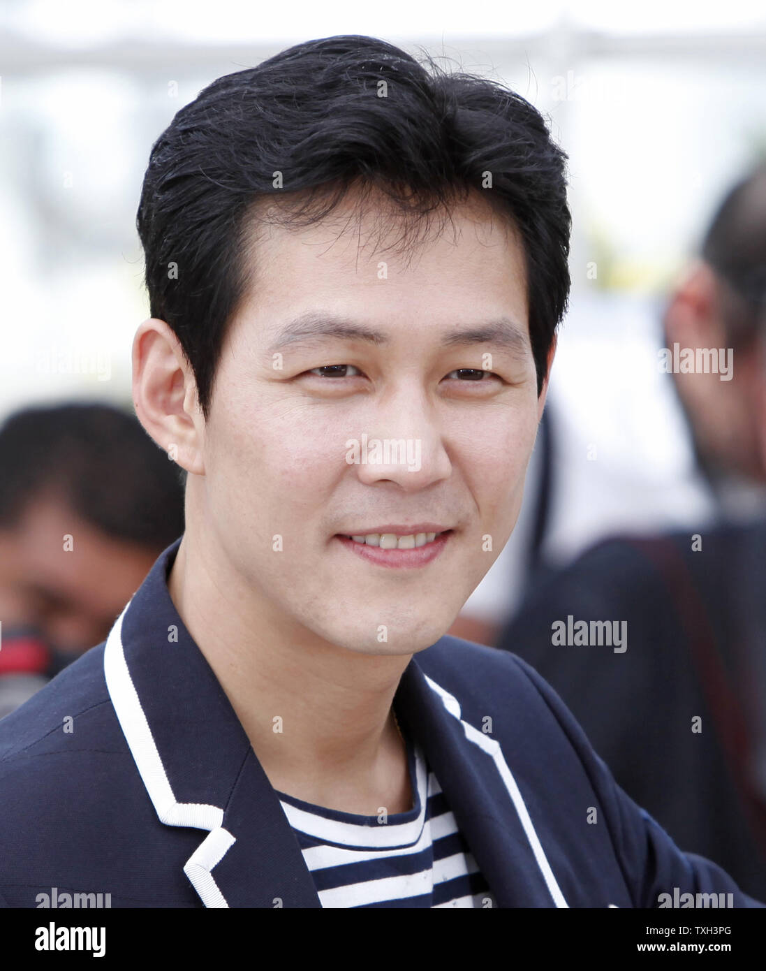 Jung-Jae Lee arrives at a photocall for the film 
