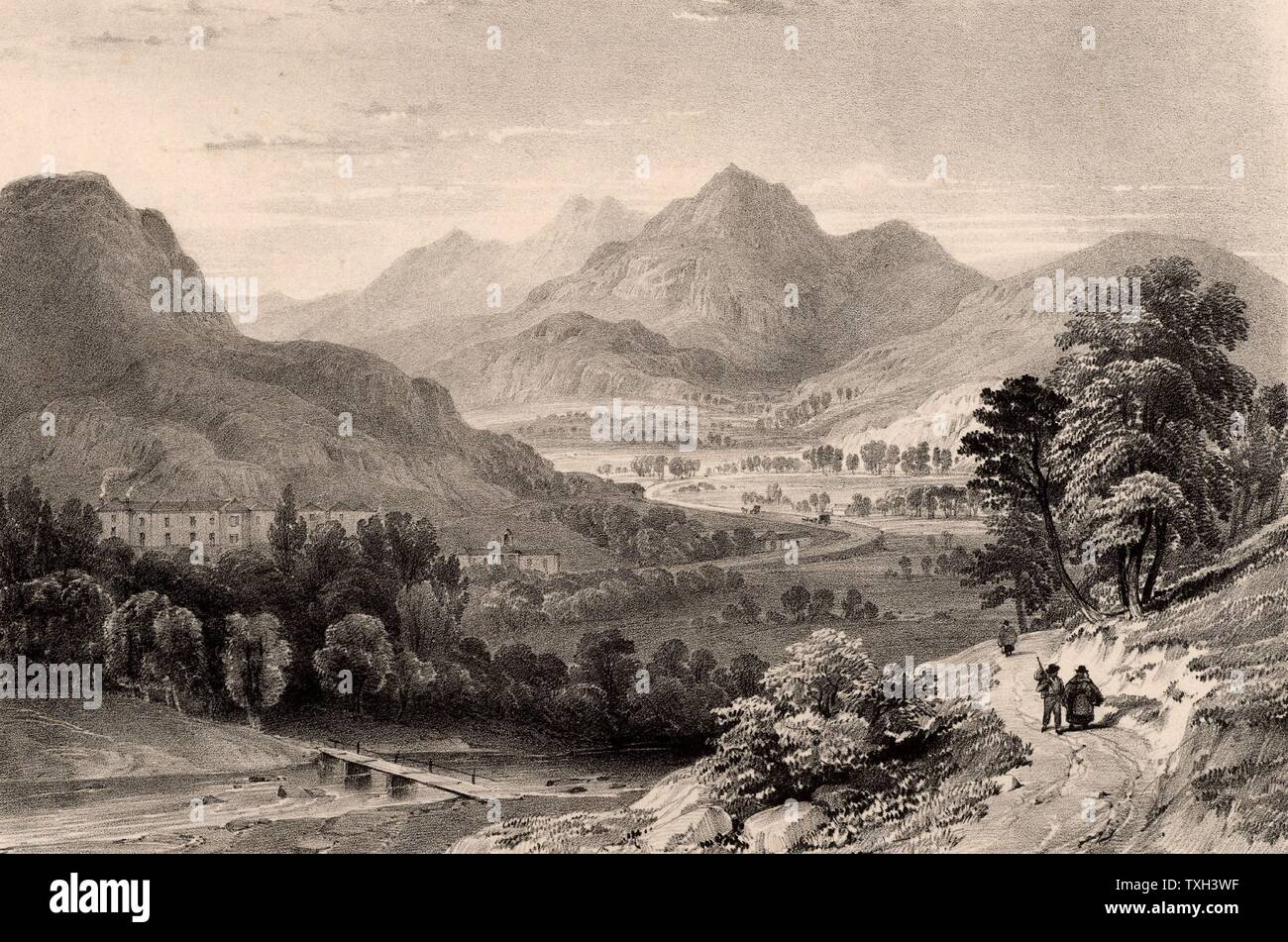 The Inn at Capel Curig from Moel Siabod' near Betws-y-Coed, Snowdonia, North Wales.  In the left foreground a simple wooden plank bridge spans the Afon Lugwy.  In the centre of the picture Thomas Telford's London to Holyhead road, the A5, winds through the valley.   Lithograph c1850. Stock Photo