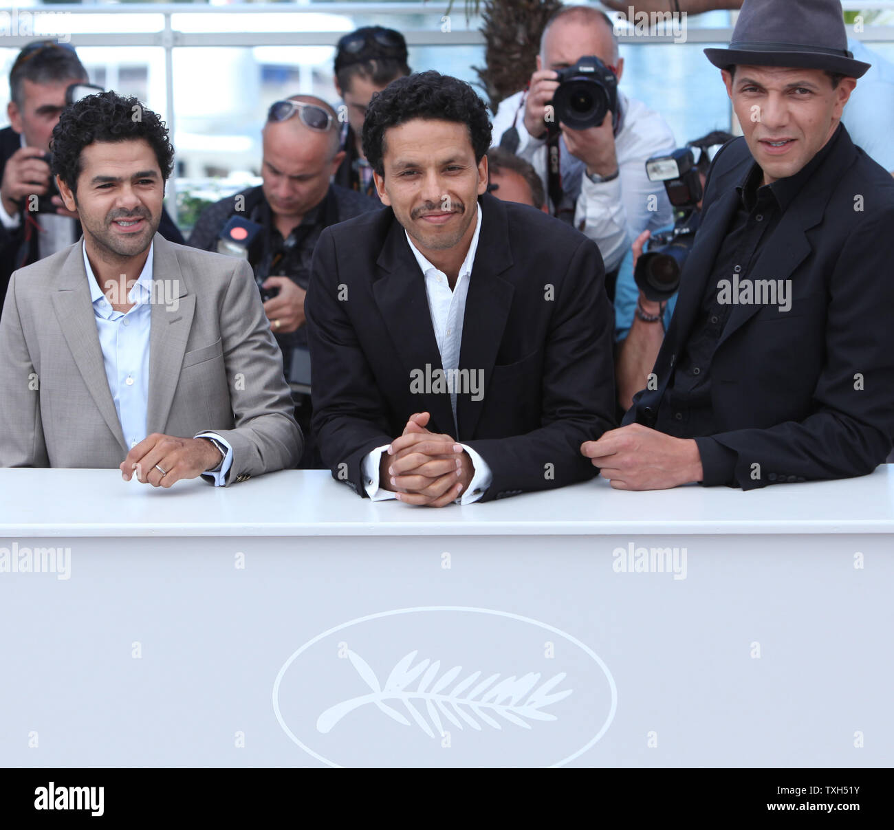 Jamel Debbouze L Sami Bouajila C And Roschdy Zem Arrive At A Photocall For The Film Hors La Loi Outside The Law At The 63rd Annual Cannes International Film Festival In Cannes