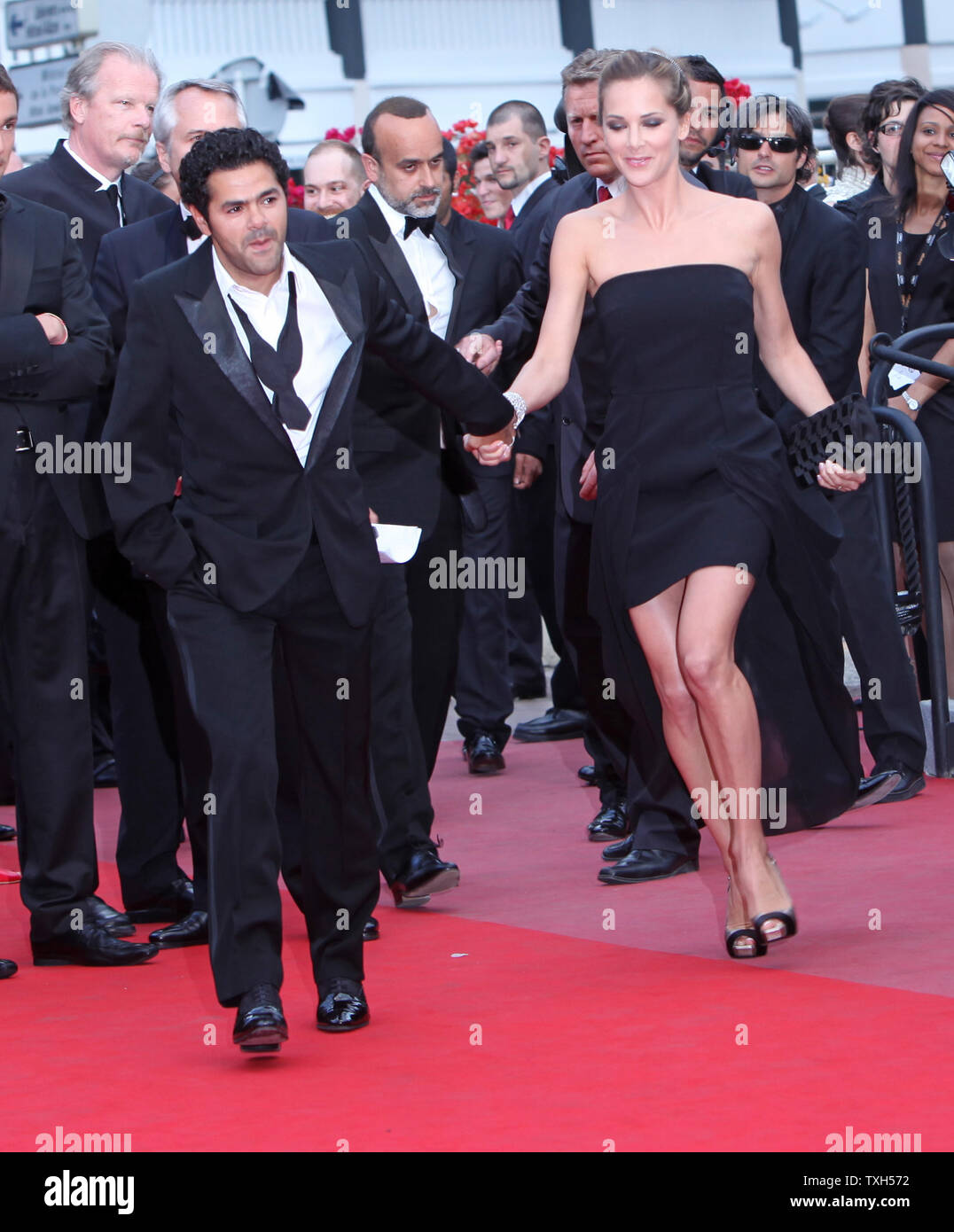 Jamel Debbouze and his wife Melissa Theuriau arrive on the red carpet before the screening of the film 'Hors La Loi (Outside of the Law)' during the 63rd annual Cannes International Film Festival in Cannes, France on May 21, 2010.  UPI/David Silpa Stock Photo