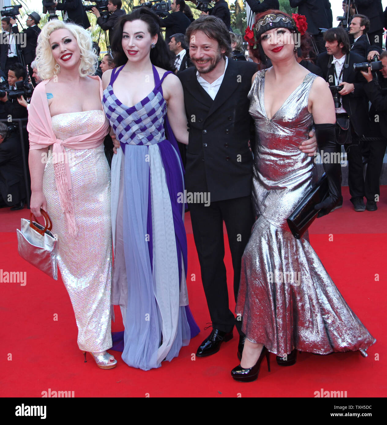 (From L to R) Mimi Le Meaux, Evie Lovelle, Mathieu Amalric and Kitten on the Keys arrive on the red carpet before the screening of the film 'The Tree' during the 63rd annual Cannes International Film Festival in Cannes, France on May 23, 2010.  UPI/David Silpa Stock Photo