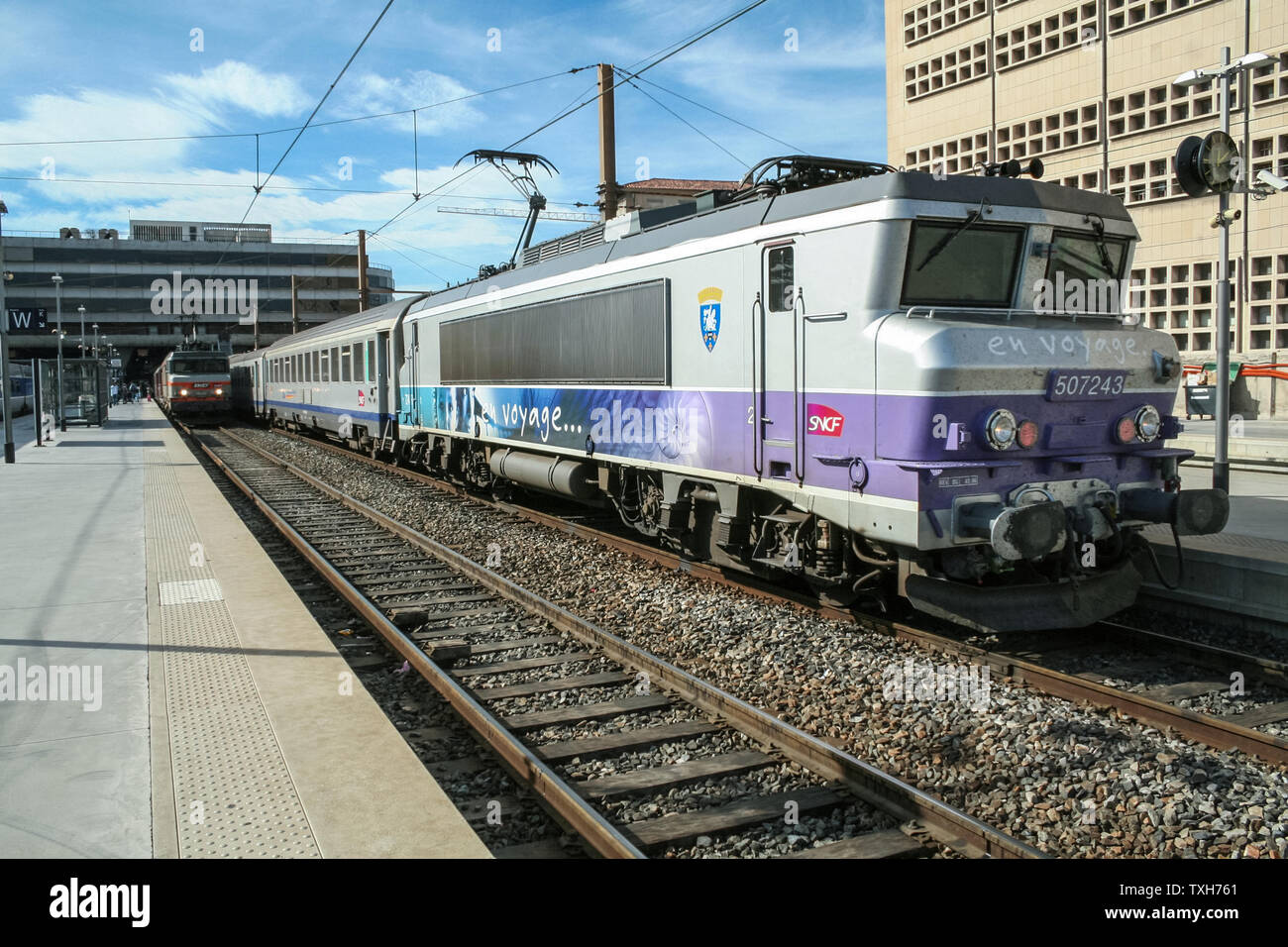 MARSEILLE, FRANCE - OCTOBER 29, 2006: Passenger TER Regional Train in Marseille Saint Charles train station, belonging to SNCF company seen in front. Stock Photo