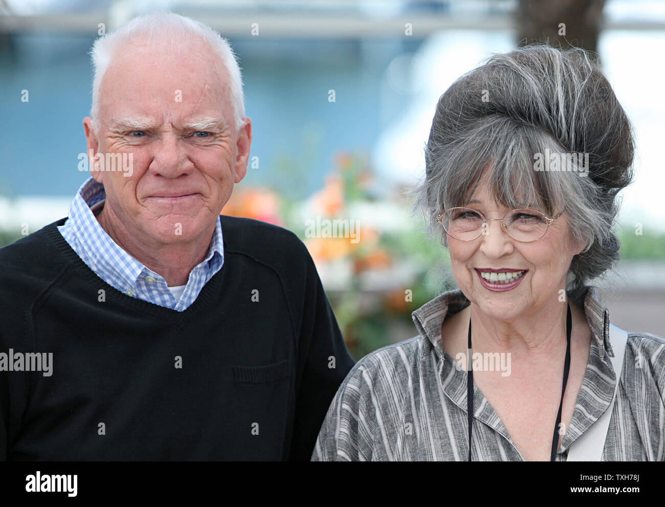 Malcolm Mcdowell L And Christiane Kubrick The Widow Of Stanley Kubrick Arrive At A Photocall For La Lecon De Cinema The Cinema Lesson During The 64th Annual Cannes International Film Festival In