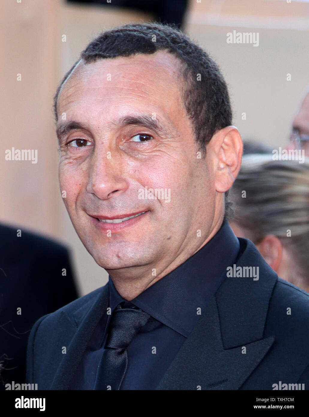 Zinedine Soualem arrives on the red carpet before the screening of the film 'La Source des Femmes (The Source)' during the 64th annual Cannes International Film Festival in Cannes, France on May 21, 2011.  UPI/David Silpa Stock Photo