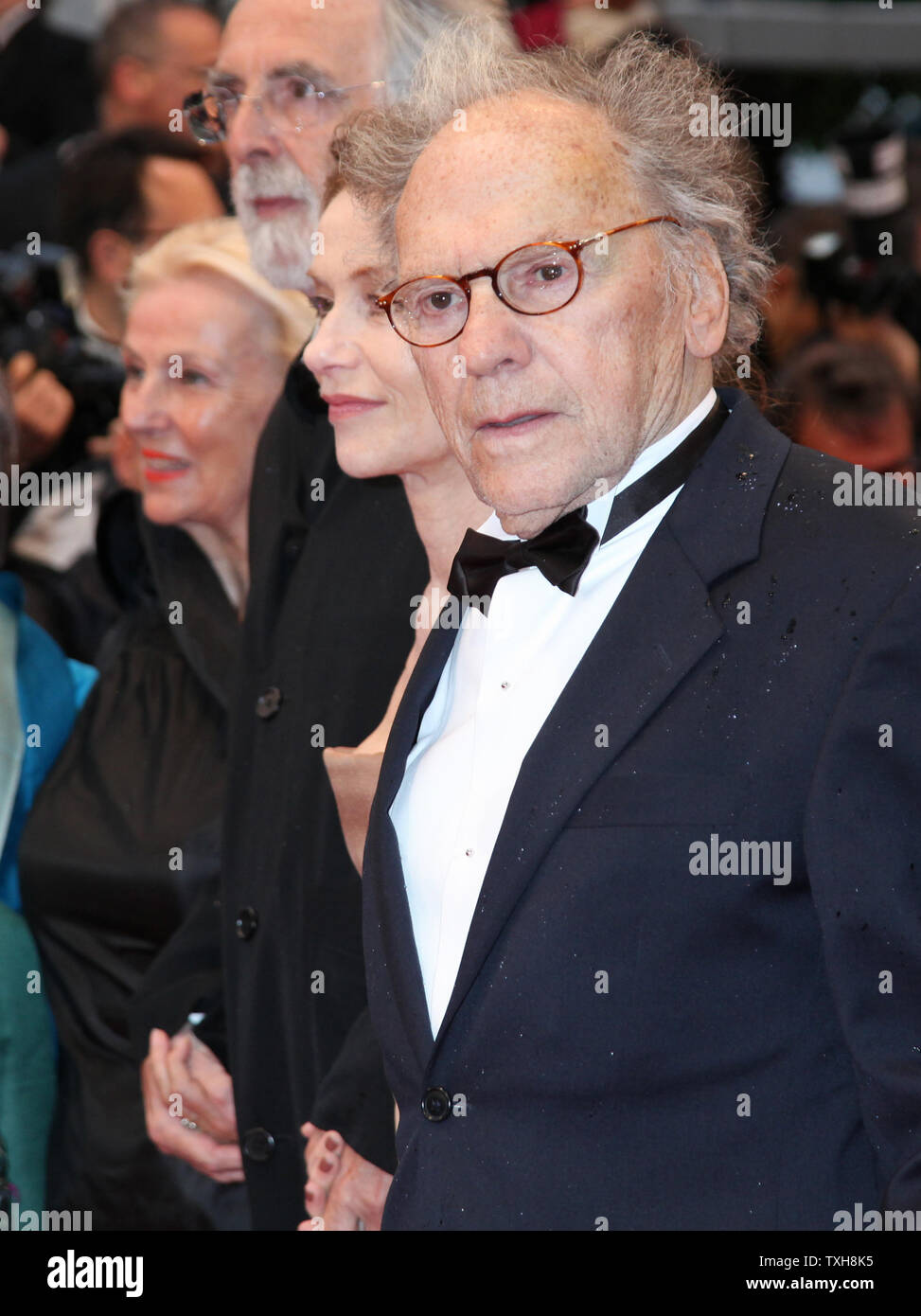 (From R to L) Jean-Louis Trintignant, Isabelle Huppert, Michael Haneke and his wife Susanne arrive on the red carpet before the screening of the film 'Amour' during the 65th annual Cannes International Film Festival in Cannes, France on May 20, 2012.  UPI/David Silpa Stock Photo
