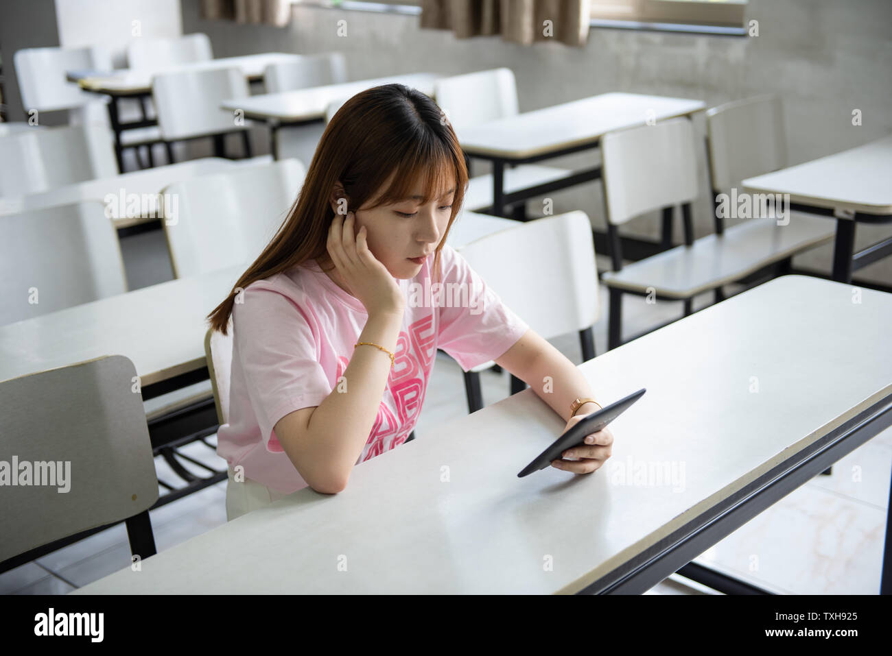 Asian college students study examination education in classrooms Stock