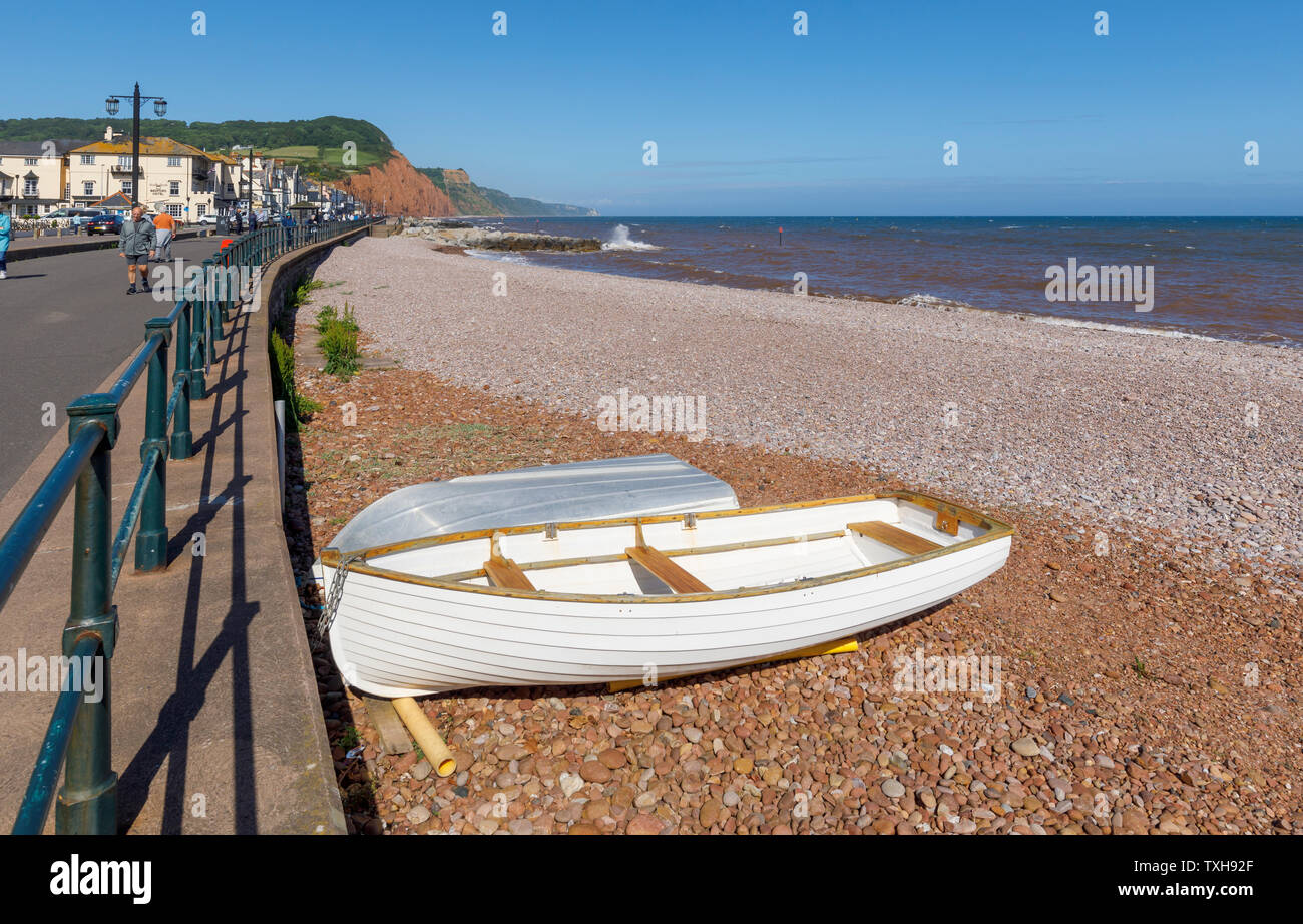 Seafront promenade and shingle beach at Sidmouth, a small popular south coast seaside town in Devon, south-west England Stock Photo