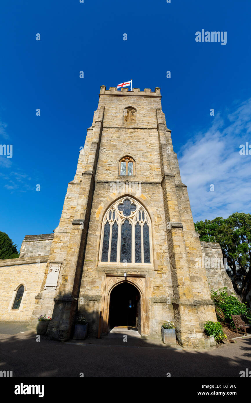 Tall tower of St Giles & St Nicholas Church, Sidmouth, a small popular south coast seaside town in Devon, south-west England on a sunny day, blue sky Stock Photo