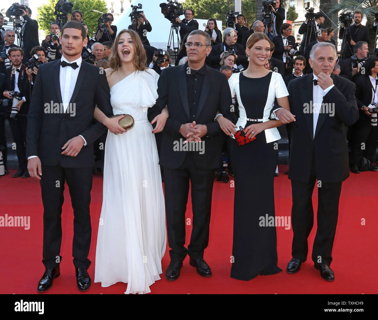(From L to R) Jeremie Laheurte, Adele Exarchopoulos, Abdellatif Kechiche, Lea Seydoux and Brahim Chioua arrive on the red carpet before the screening of the film 'Zulu' during the 66th annual Cannes International Film Festival in Cannes, France on May 26, 2013.  UPI/David Silpa Stock Photo