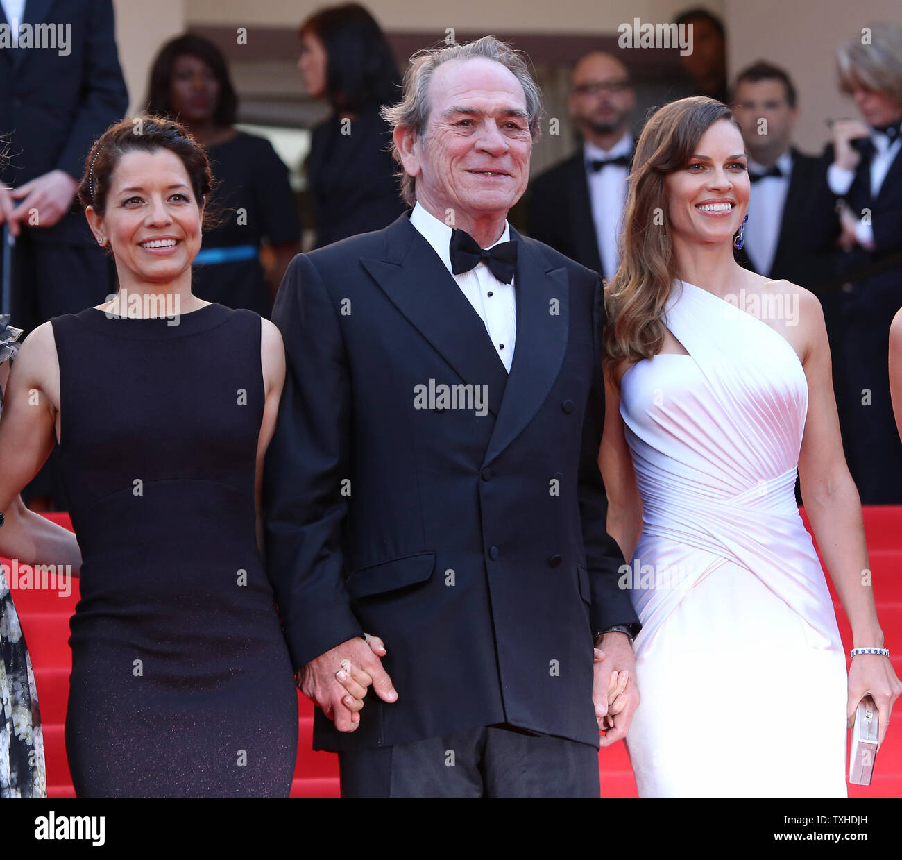 Tommy Lee Jones (C), Hilary Swank (R) and guest arrive on the steps of the Palais des Festivals before the screening of the film "The Homesman" during the 67th annual Cannes International Film Festival in Cannes, France on May 18, 2014.  UPI/David Silpa Stock Photo