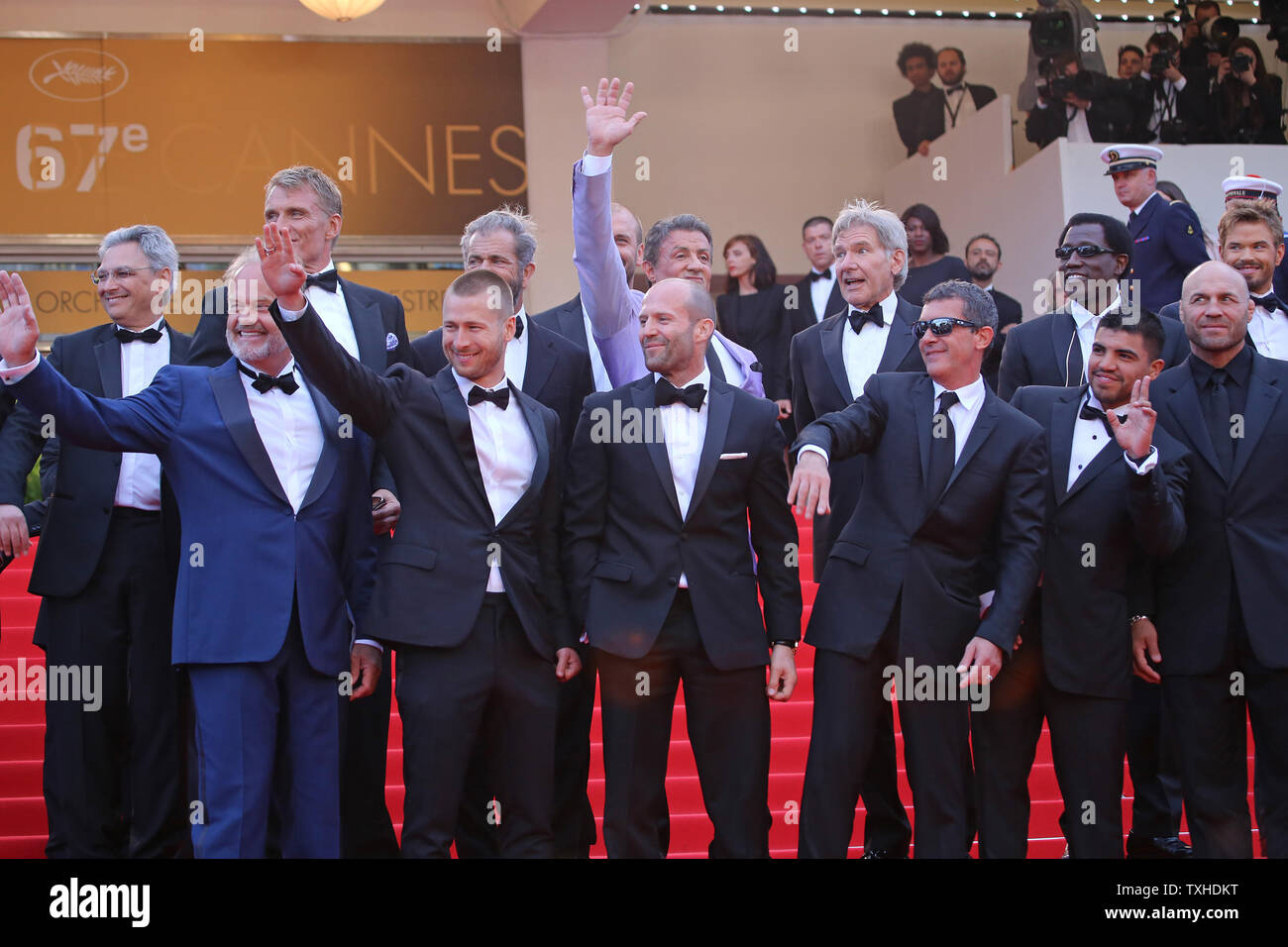 The team from the film 'The Expendables 3' including Glen Powell, Kelsey Grammer, Dolph Lundgren, Harrison Ford, Patrick Hughes, Antonio Banderas, Randy Couture, Victor Ortiz, Mel Gibson, Jason Statham, Sylvester Stallone, Ronda Rousey, Wesley Snipes, Kellan Lutz, and Avi Lerner arrive on the steps of the Palais des Festivals before the screening of the film during the 67th annual Cannes International Film Festival in Cannes, France on May 18, 2014.  UPI/David Silpa Stock Photo