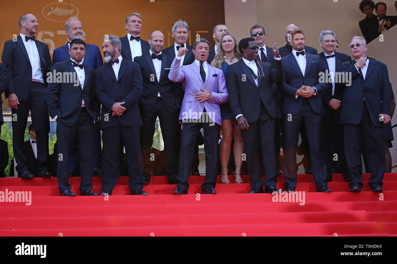 The team from the film 'The Expendables 3' including Glen Powell, Kelsey Grammer, Dolph Lundgren, Harrison Ford, Patrick Hughes, Antonio Banderas, Randy Couture, Victor Ortiz, Mel Gibson, Jason Statham, Sylvester Stallone, Ronda Rousey, Wesley Snipes, Kellan Lutz, and Avi Lerner arrive on the steps of the Palais des Festivals before the screening of the film during the 67th annual Cannes International Film Festival in Cannes, France on May 18, 2014.  UPI/David Silpa Stock Photo