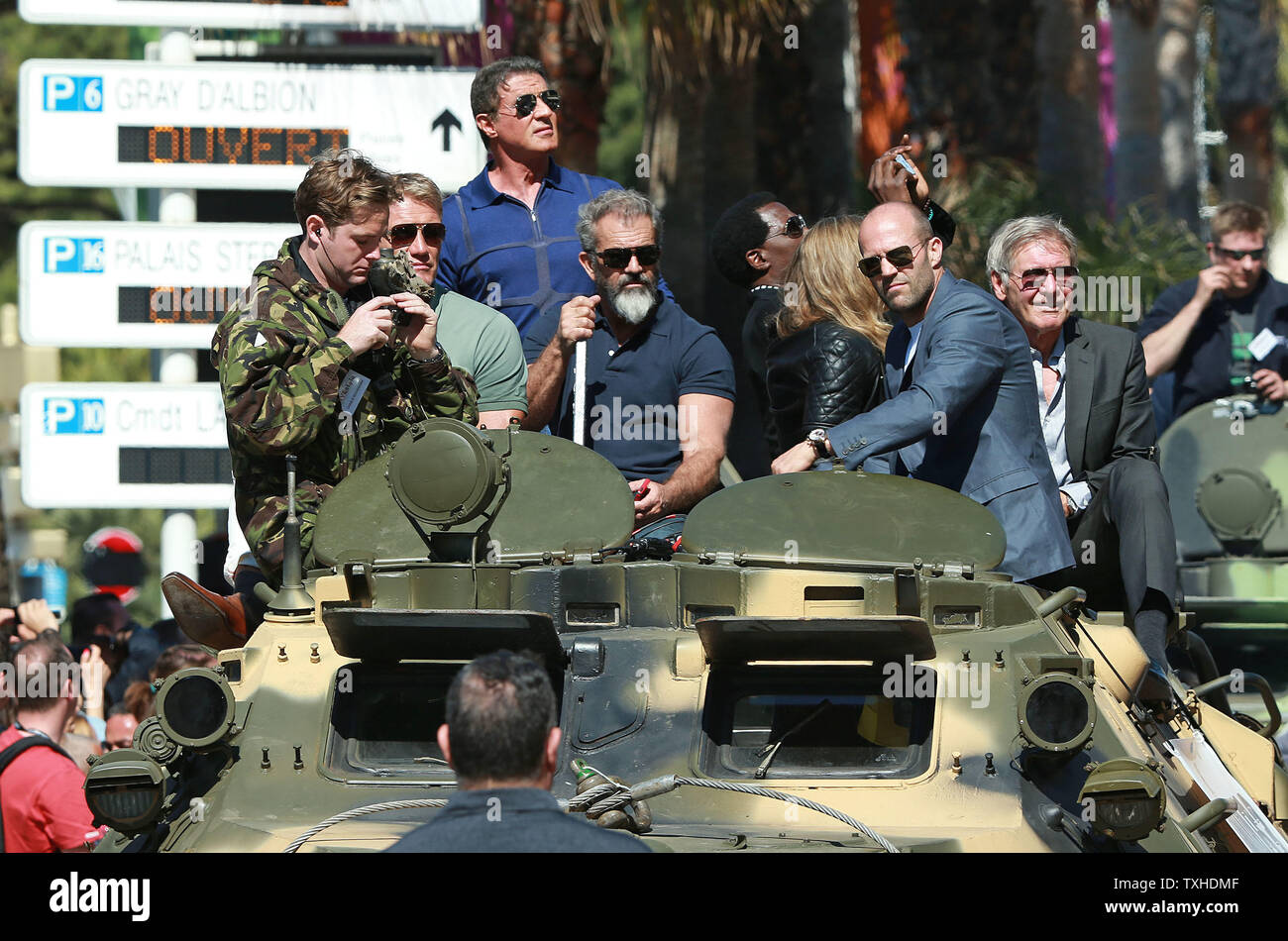Actors Including Dolph Lundgren, Mel Gibson, Jason Statham, Sylvester  Stallone, Harrison Ford And Wesley Snipes Arrive On A Tank For A Photo Call  For The Film The Expendables 3 During The 67Th