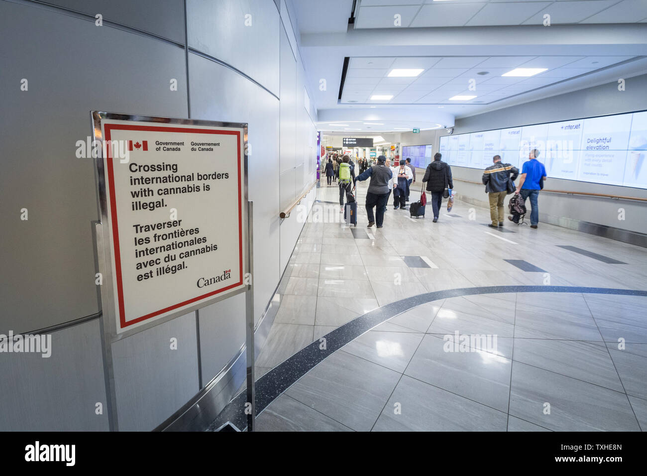 TORONTO, CANADA - NOVEMBER 15, 2018: Sign in Toronto Alan Pearson Airport reminding it is forbidden to export Cannabis outside of Canada, despite the Stock Photo