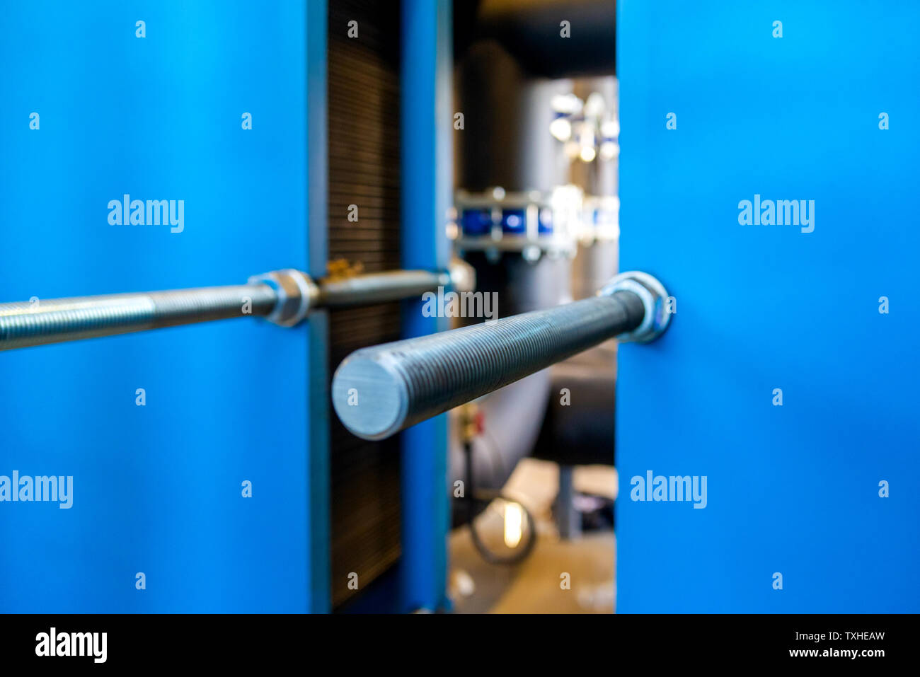 Heat exchangers for cooling medium of water, oil and gas process. Boiler room or oil refinery. Industrial equipment. Selective focus. Stock Photo