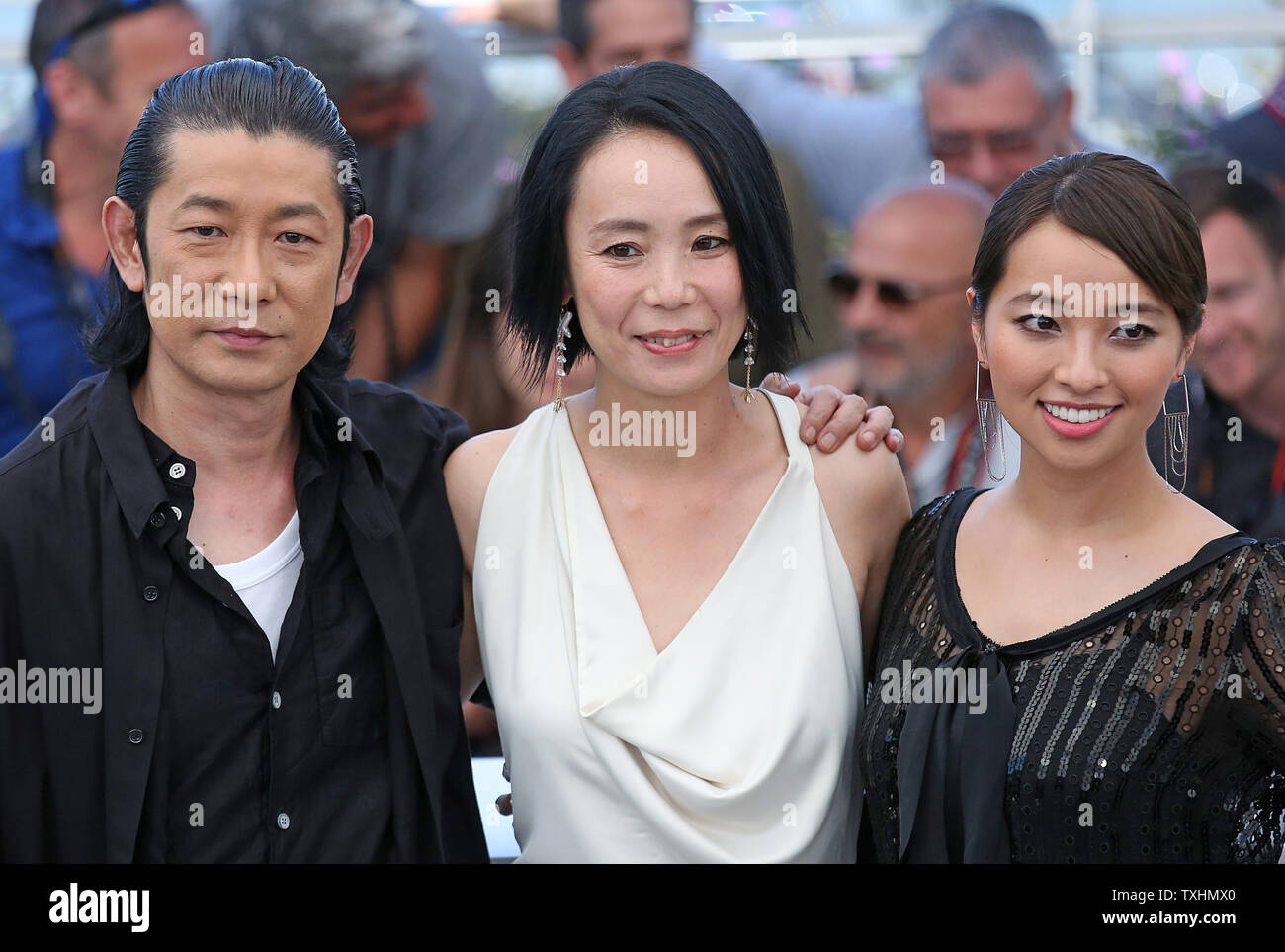 Masatoshi Nagase (L), Naomi Kawase and Ayame Misaki arrive at a photocall for the film 'Hikari (Radiance)' during the 70th annual Cannes International Film Festival in Cannes, France on May 23, 2017.  Photo by David Silpa/UPI Stock Photo