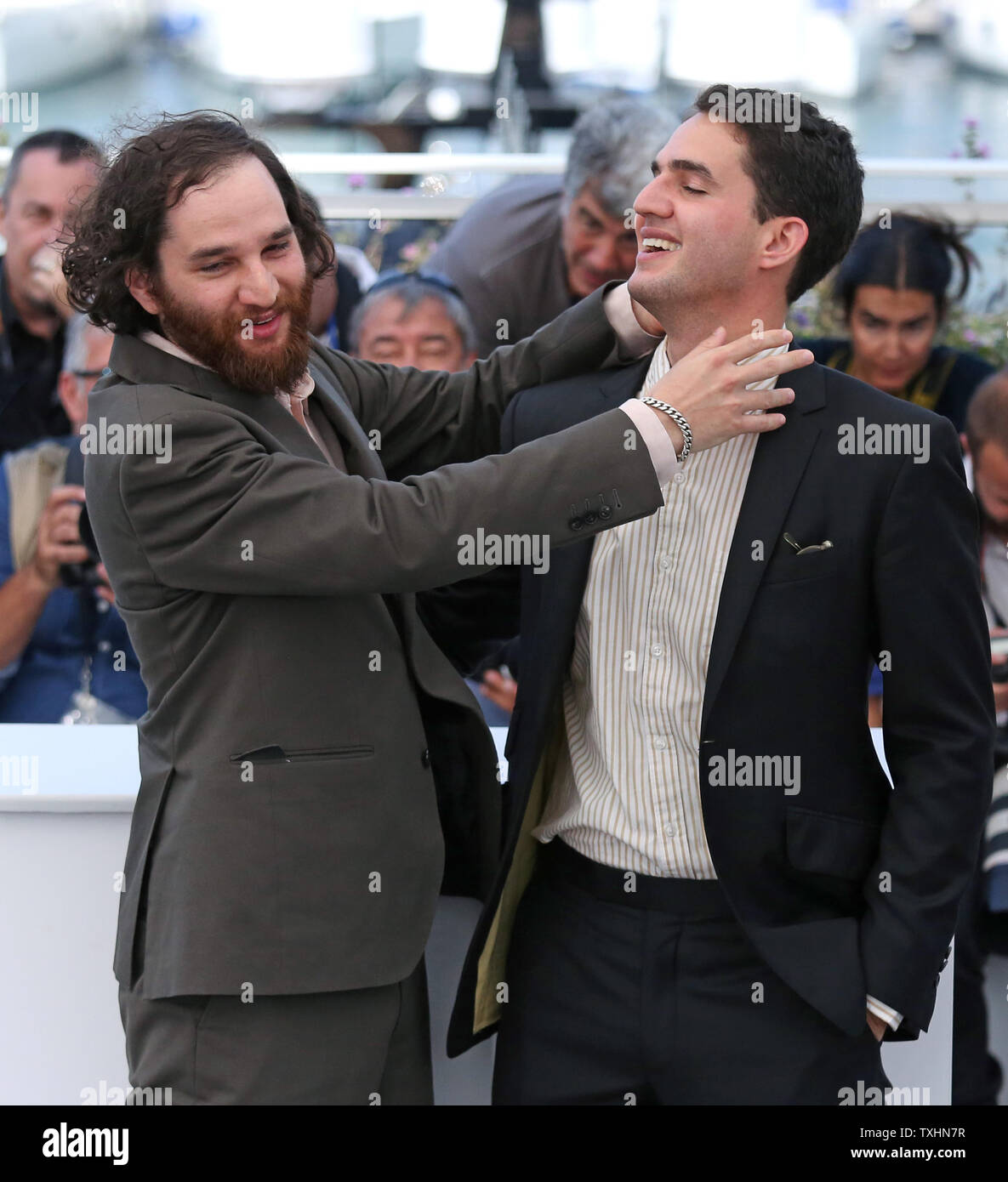 Josh Safdie (L) and Benny Safdie arrive at a photocall for the film