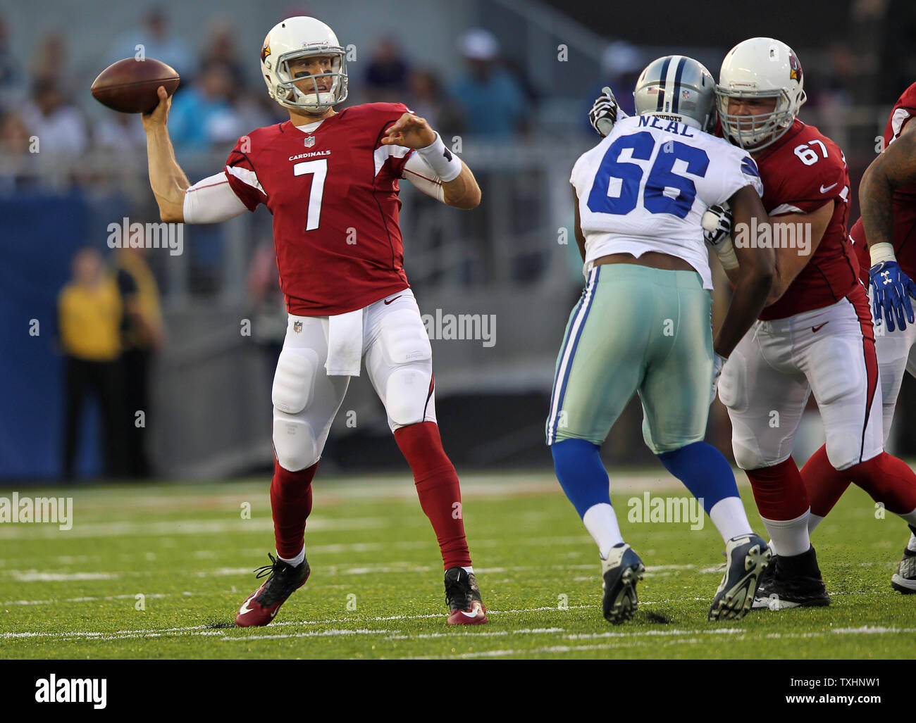 Arizona Cardinals Blaine Gabbert throws a pass behind the block of Tony Bergstrom on Dallas Cowboys Lewis Neal during the first quarter of the Pro Football Hall of Fame Game at Tom Benson Hall of Fame Stadium in Canton OH August 3, 2017. Photo by Aaron Josefczyk/UPI Stock Photo