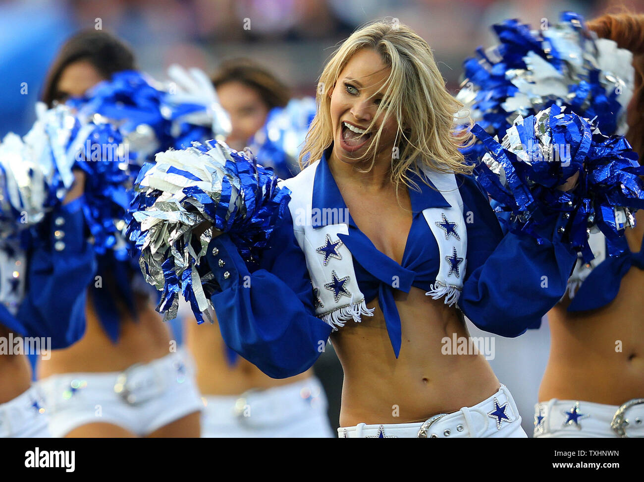 The Dallas Cowboys cheerleaders perform prior to the start of the Pro ...