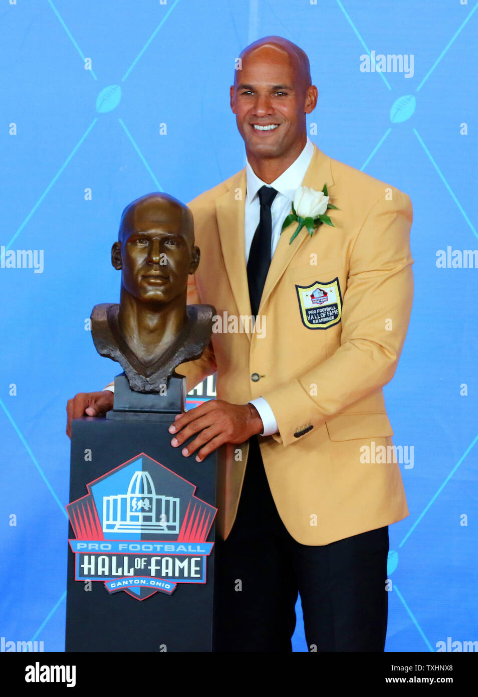 Jason Taylor poses with his bust after being inducted into the Pro Football Hall of Fame at Tom Benson Hall of Fame Stadium in Canton, OH August 5, 2017.    Photo by Aaron Josefczyk/UPI Stock Photo