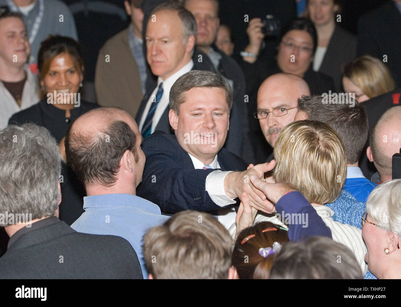 Federal Conservative leader Stephen Harper greets supporters at his campaign headquarters in the Telus Convention Center in Calgary, Alberta after winning the Canada federal election with a minority, January 23, 2006. (UPI Photo/Heinz Ruckemann) Stock Photo